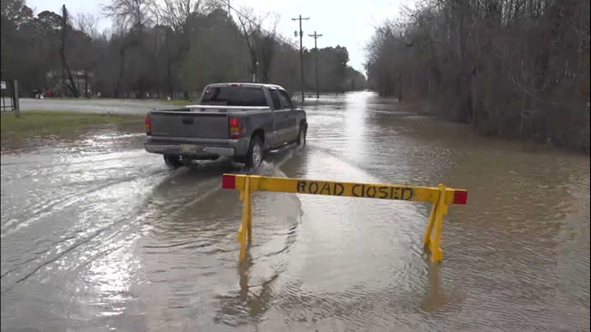 Drivers Dangerously Proceed Down Road Closed Due To Flooding ...