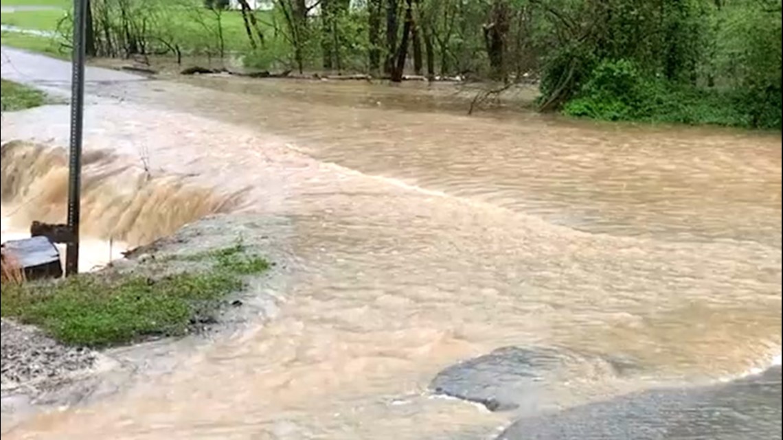 Entire road submerged underwater by flash flooding | 12newsnow.com