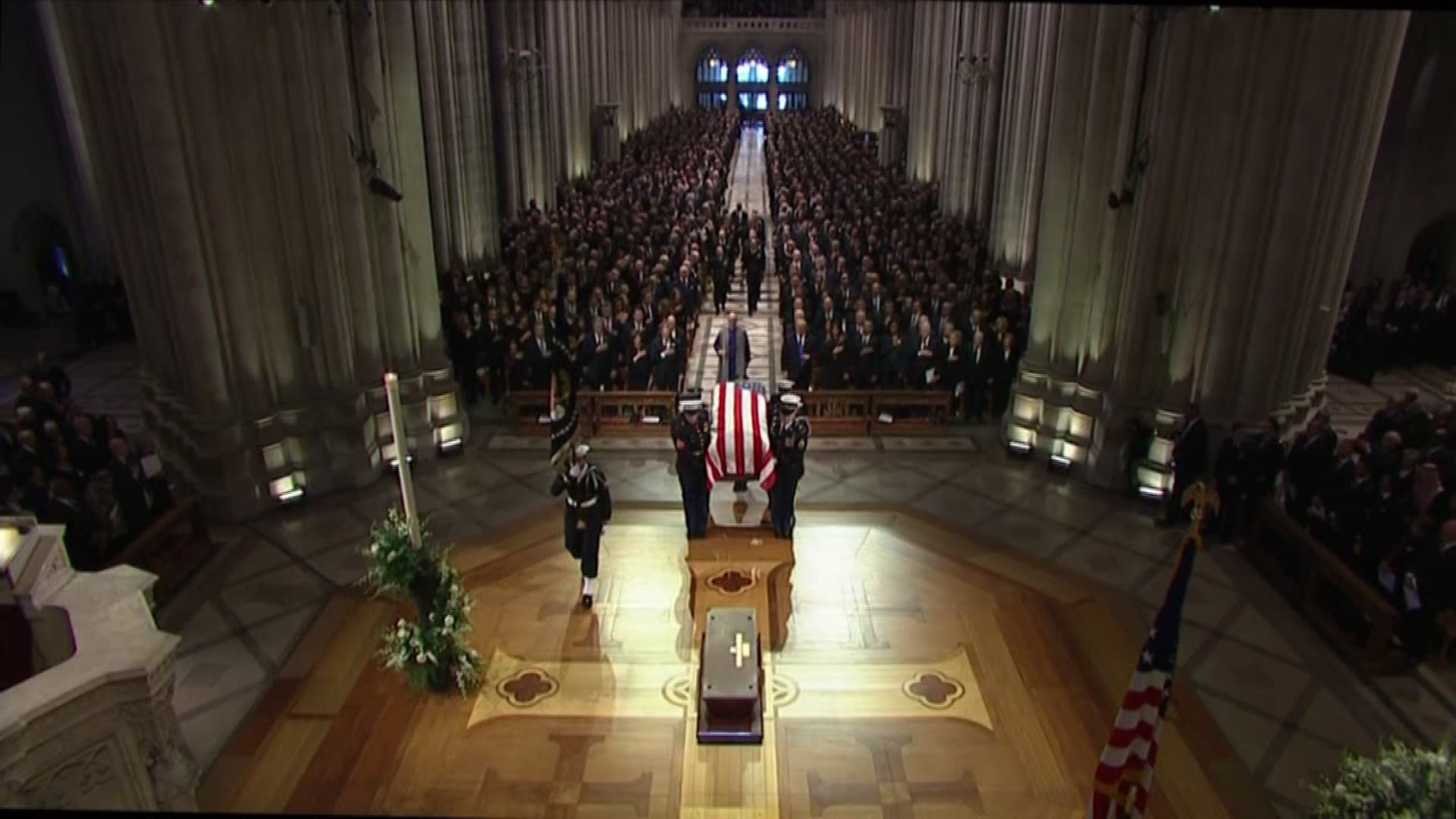 Former President George H.W. Bush was celebrated with praise and humor by friends and family during a state funeral at National Cathedral in Washington, D.C.