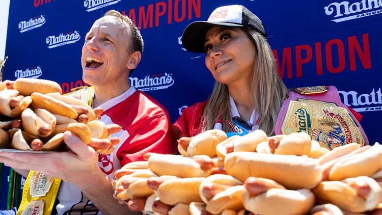 Joey Chestnut takes down protester during 15th July 4 hot dog eating contest win