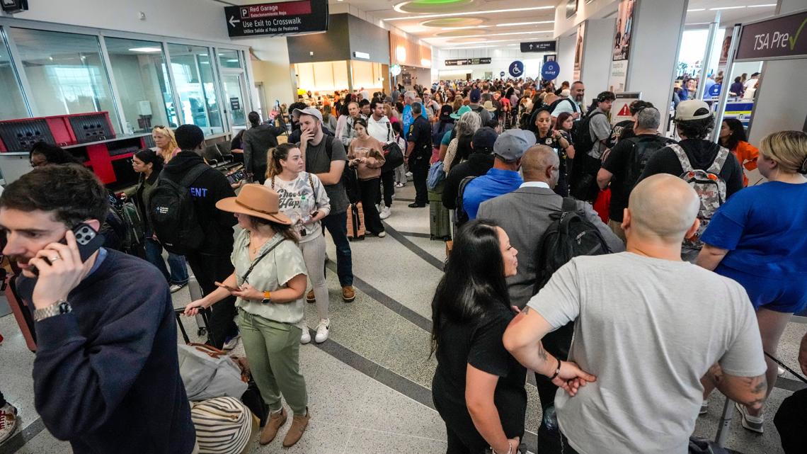 Closure of LaGuardia Airport in New York after deadly crash adds to mounting travel woes