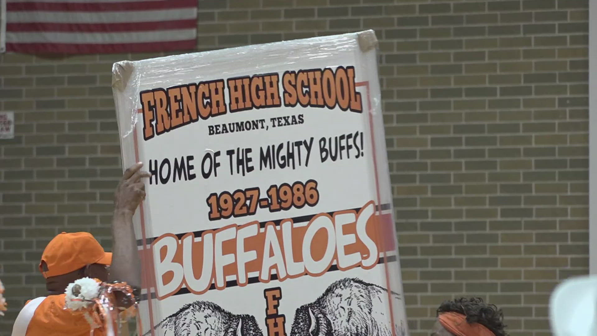 Hundreds of "buffalos" met at the old high school's parking lot for a parade before holding a pep rally in the old gym.