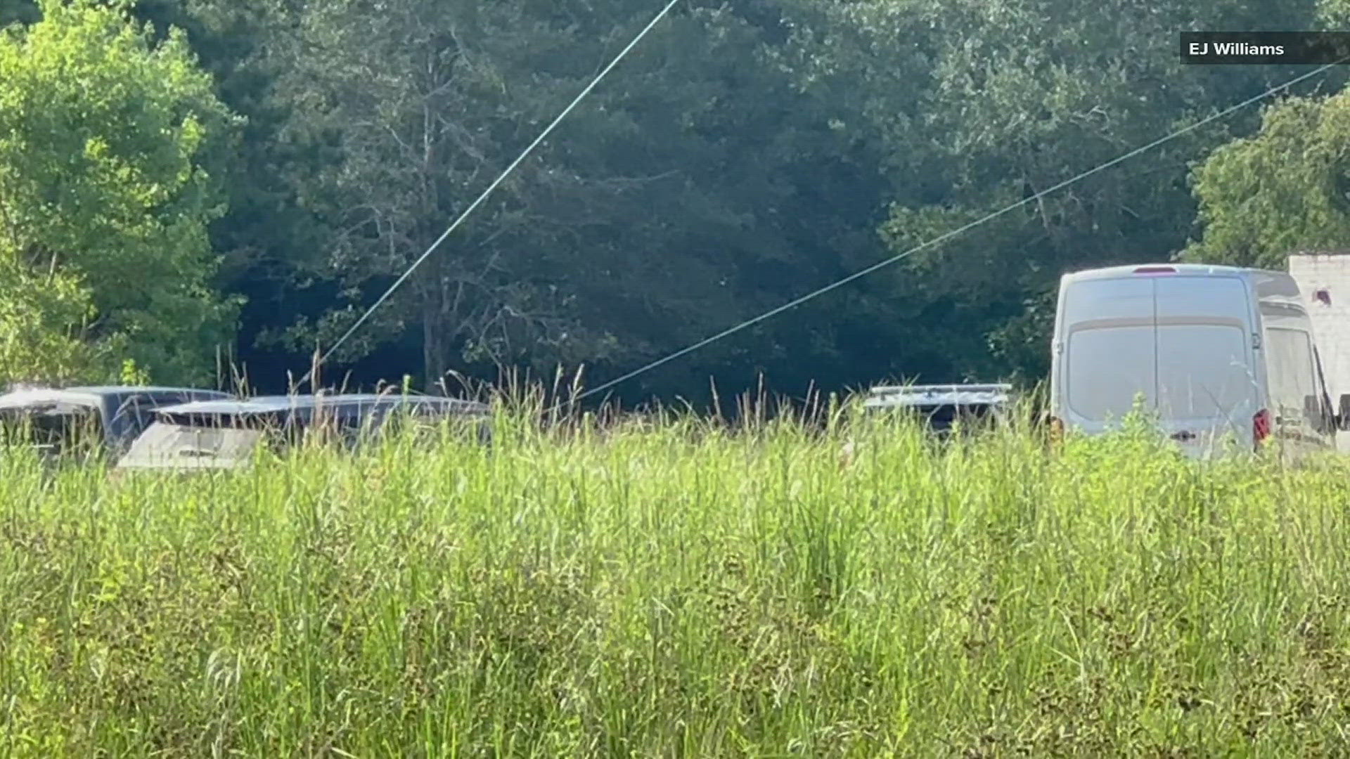 The site appears to be near a couple of old buildings and a antenna tower.