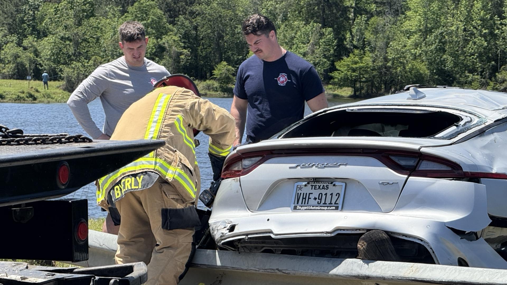 One thrown, one climbs out before car sinks in water after crash ...