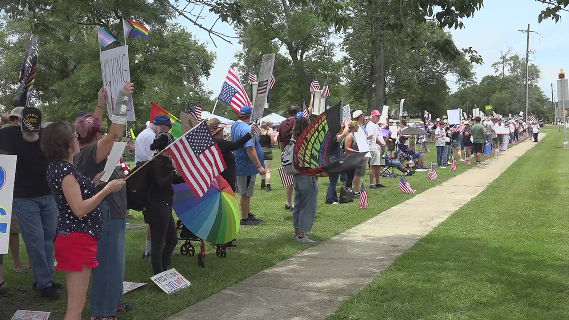 Music and chants rang out across Rodgers park as hundreds gathered with signs in hand to protest President Donald Trump.