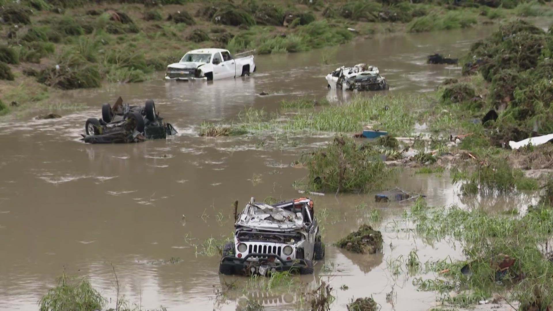 Officials say several cars were sitting traffic in the area of Austin Highway and Perrin Beitel when water came rushing in.