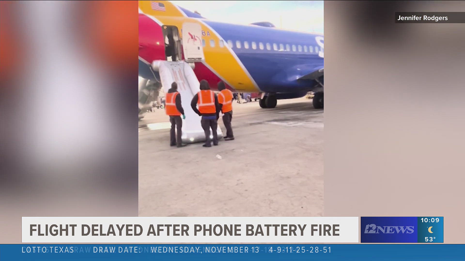 One person suffered a minor injury during the evacuation, while another, whose phone was the source of the fire, was treated for burns, airline officials said.