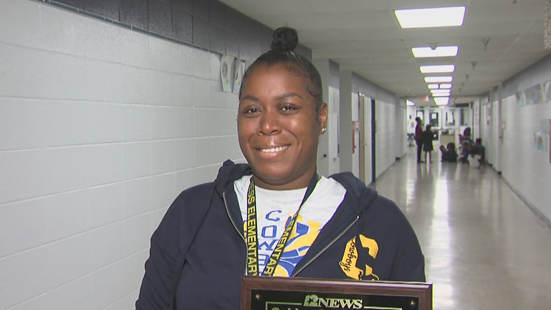 Taylor Allen, who teaches second grade reading and social studies at Roy Guess Elementary,  teaches the basics and works as a cheer coach at the Beaumont school.