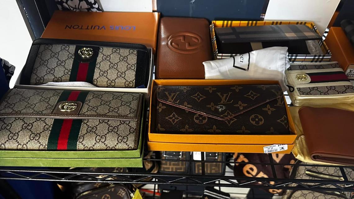 FILE--Fake Louis Vuitton handbags are confiscated at a warehouse