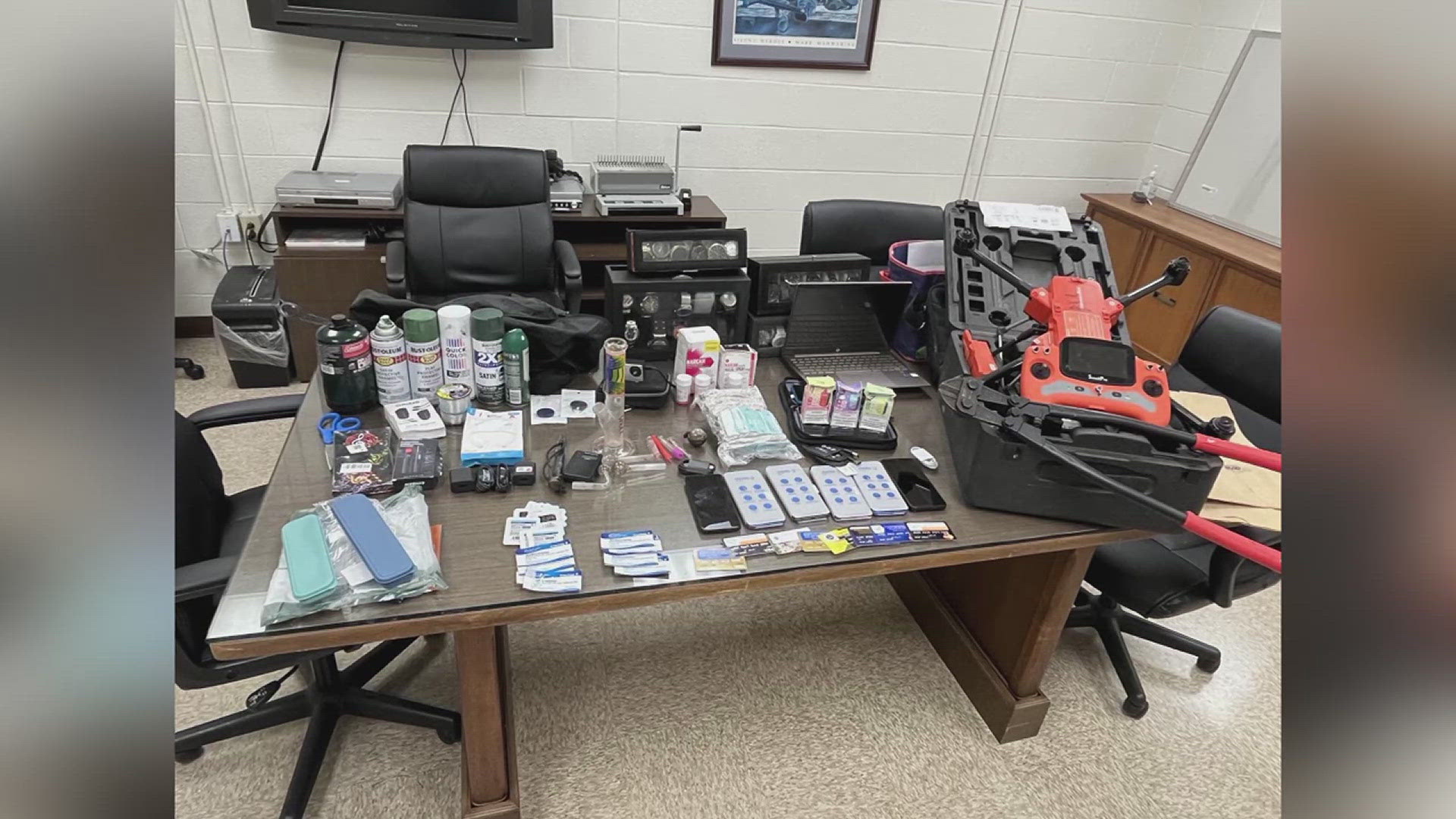 Some of the contraband that deputies confiscated along with the drone includes cell phones, drug paraphernalia, watches, Narcan, spray paint and various electronics.