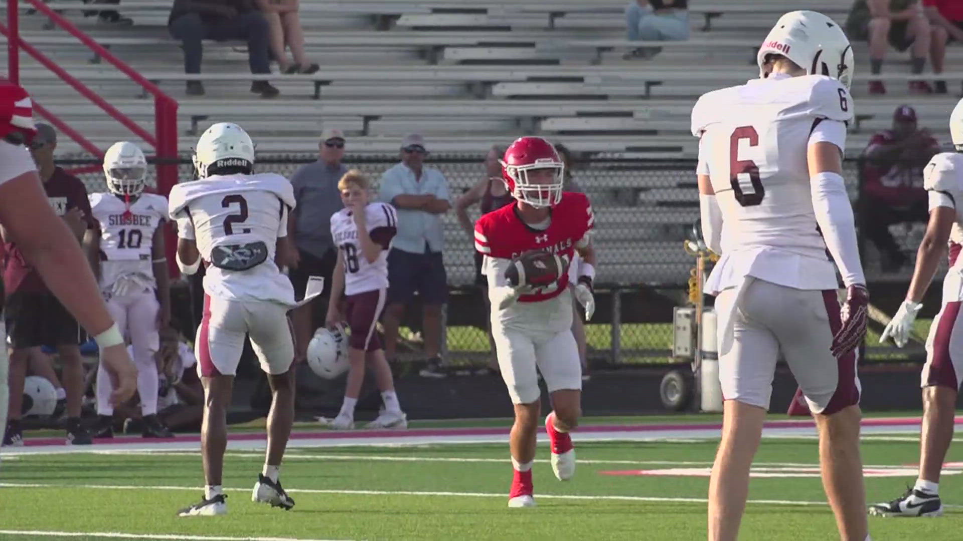 The Silsbee Tigers and Bridge City Cardinals show defensive strength in a scrimmage, previewing the high school football season.