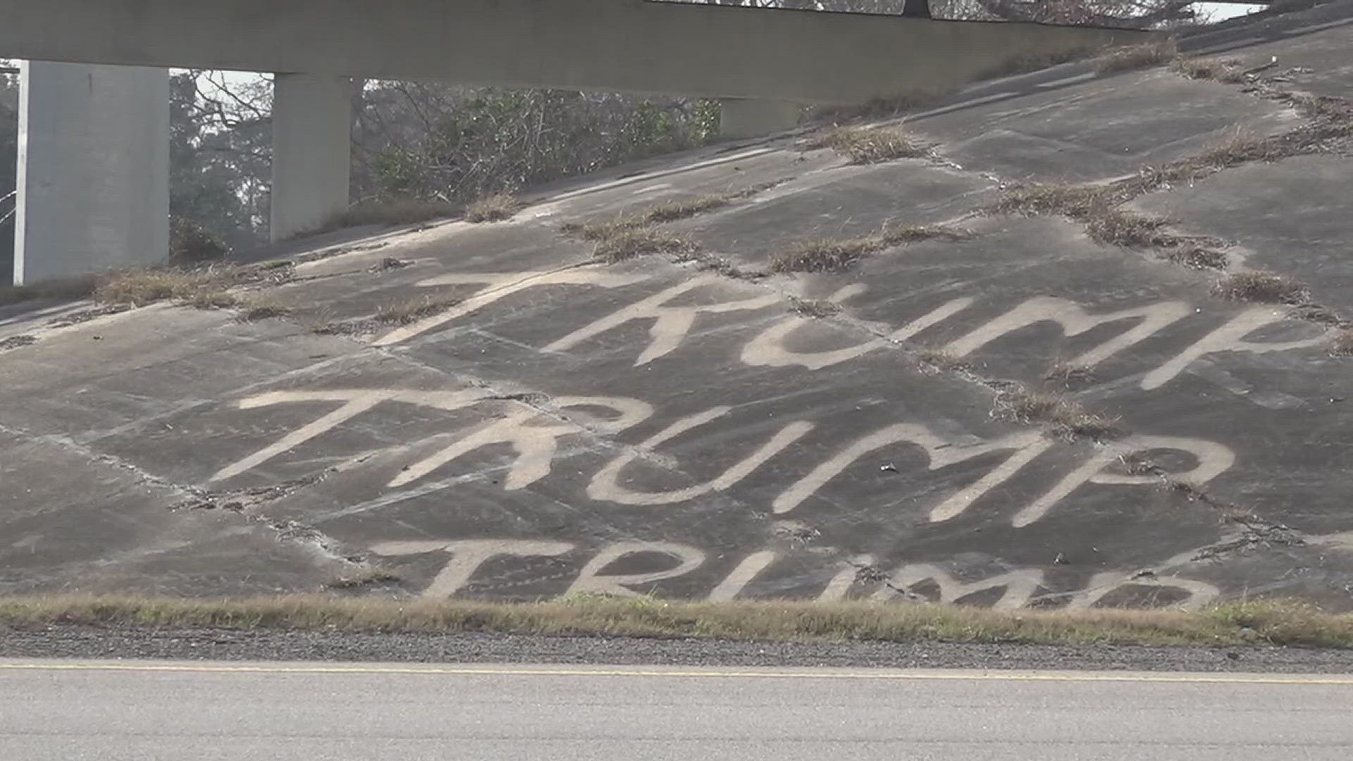 Mysterious TRUMP pressure-washed 'graffiti' getting washed away