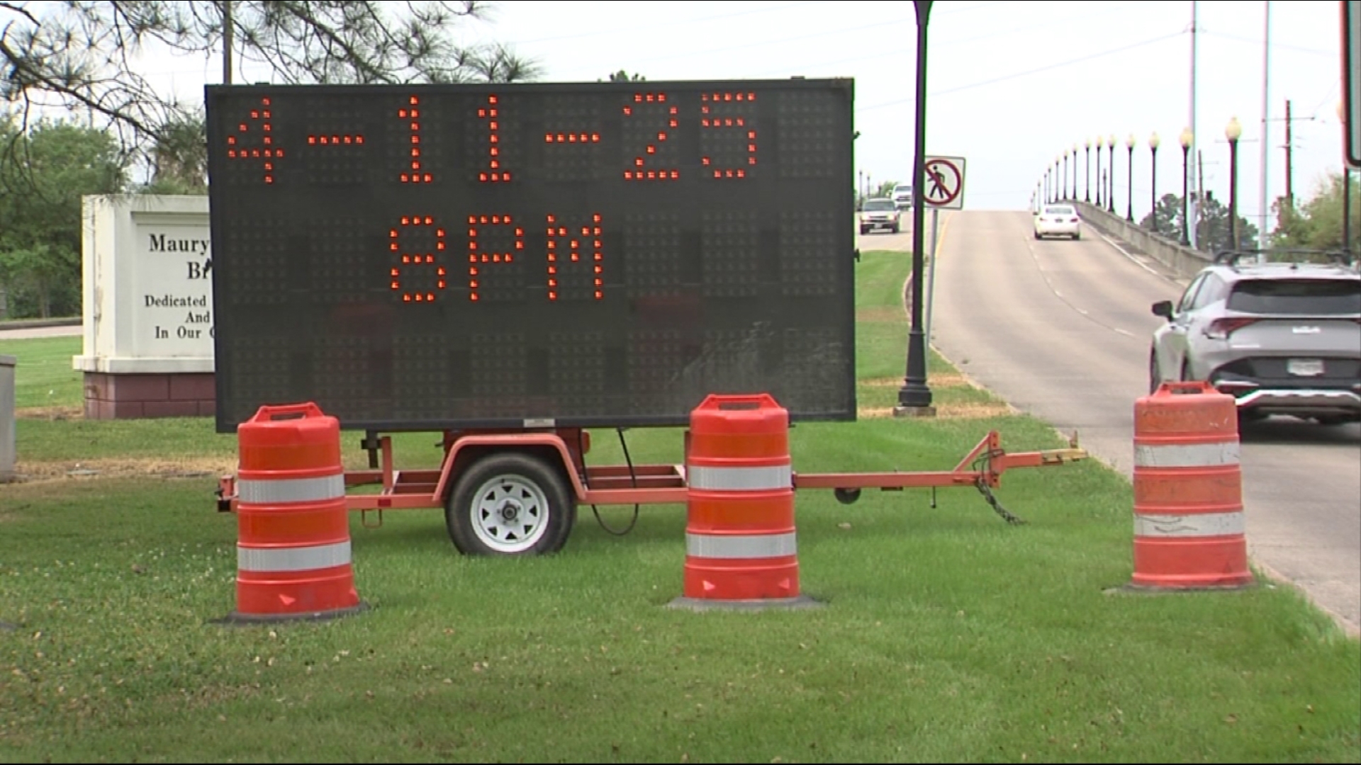 A newly erected sign in front of the bridge indicates that it will be closed April 11, 2025 ahead of the demolition.
