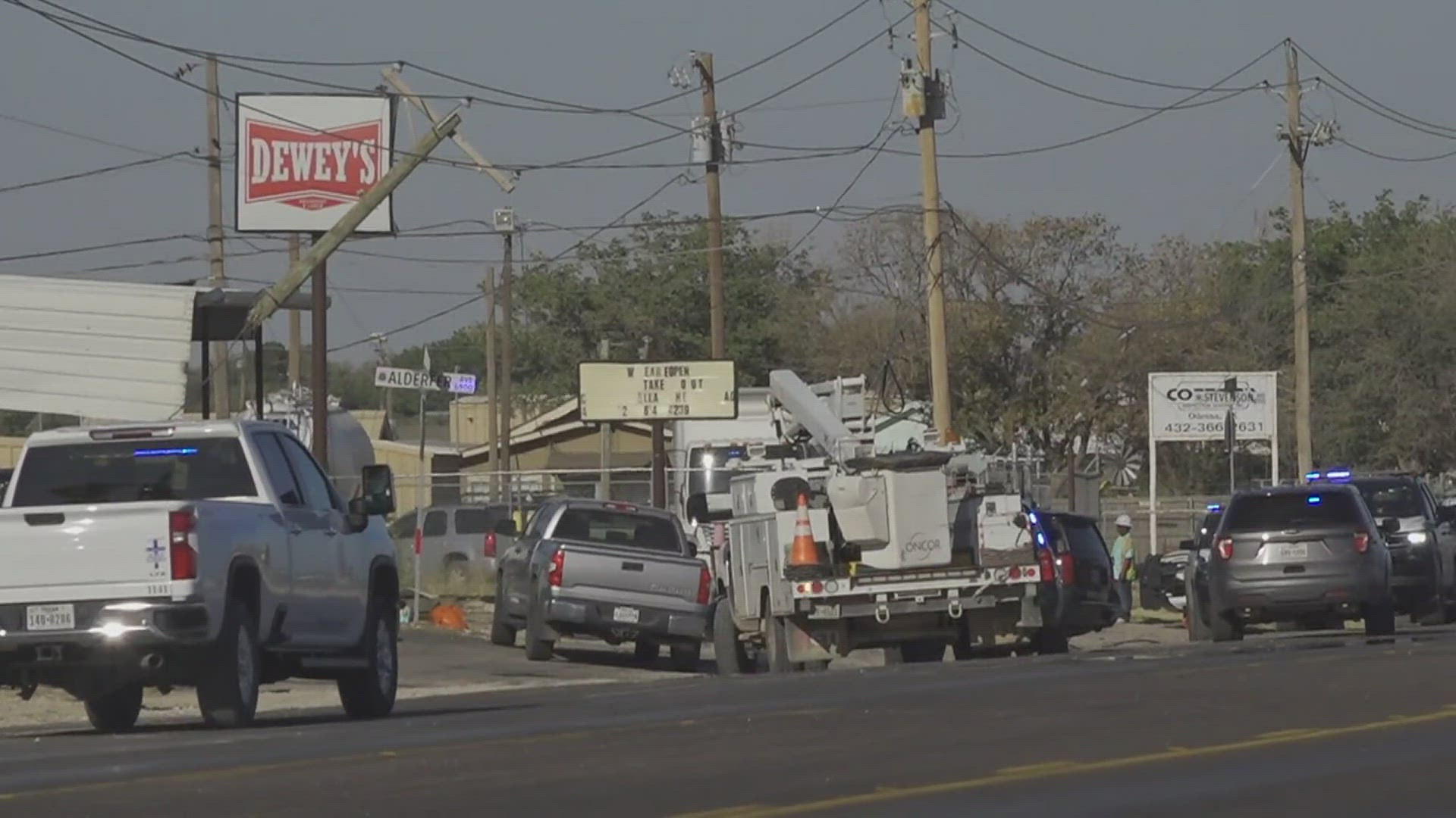 Witnesses said the plane struggled to gain altitude after taking off from an Odessa airport and then struck a power line before crashing in an alley at about 7 a.m.