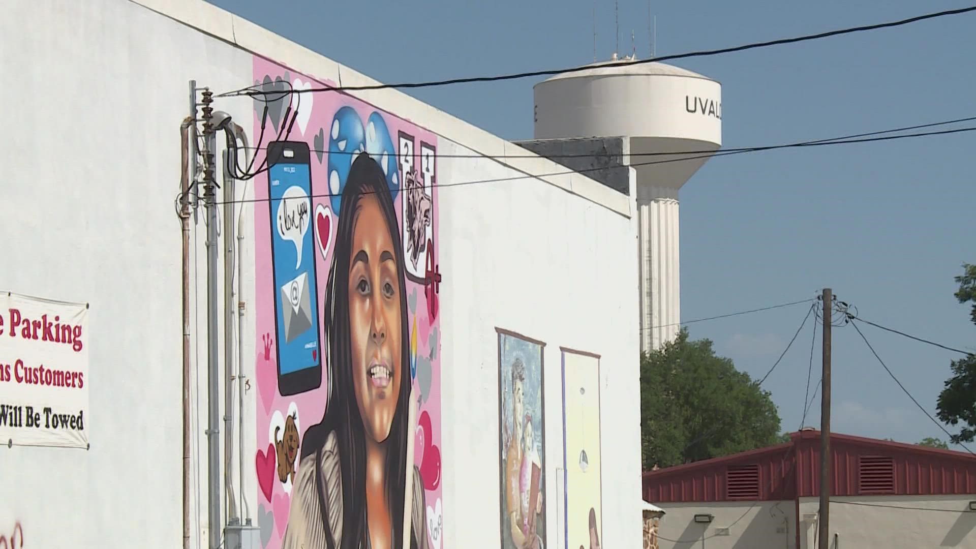More than fifty artists are taking in part in creating murals of the 19 students and 2 teachers.
