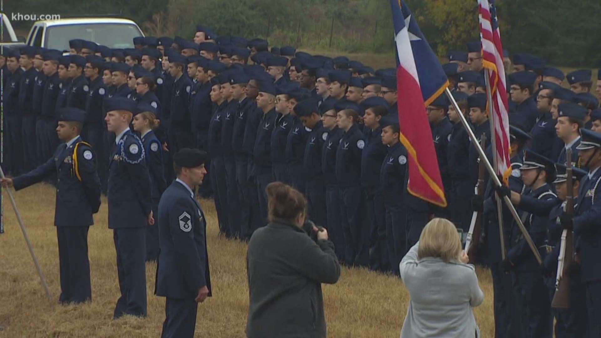 The Klein Oak High School band and ROTC played as President George H.W. Bush's train passed through the Spring area en route to his final resting place in College Station.