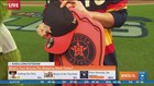 Orbit and Brandi show off swag from Astros store at Minute Maid