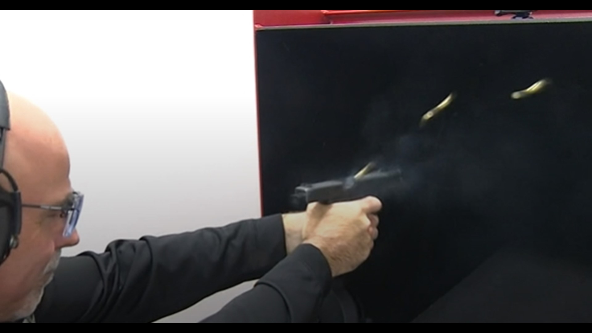 Houston's division of the Bureau of Alcohol, Tobacco, Firearms and Explosives shows Melissa Correa the device that could make a gun fire 30 rounds in 2 seconds.