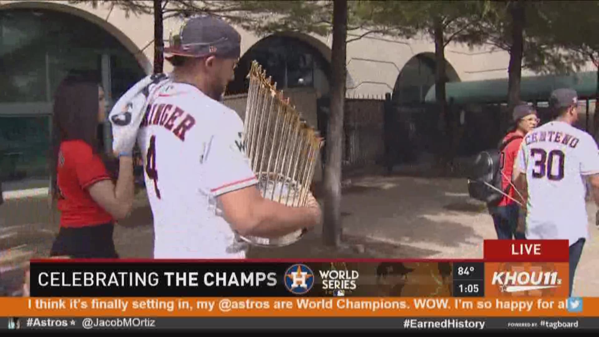Astros players start to come out of Minute Maid Park before the start of Houston's World Series Championship Parade.