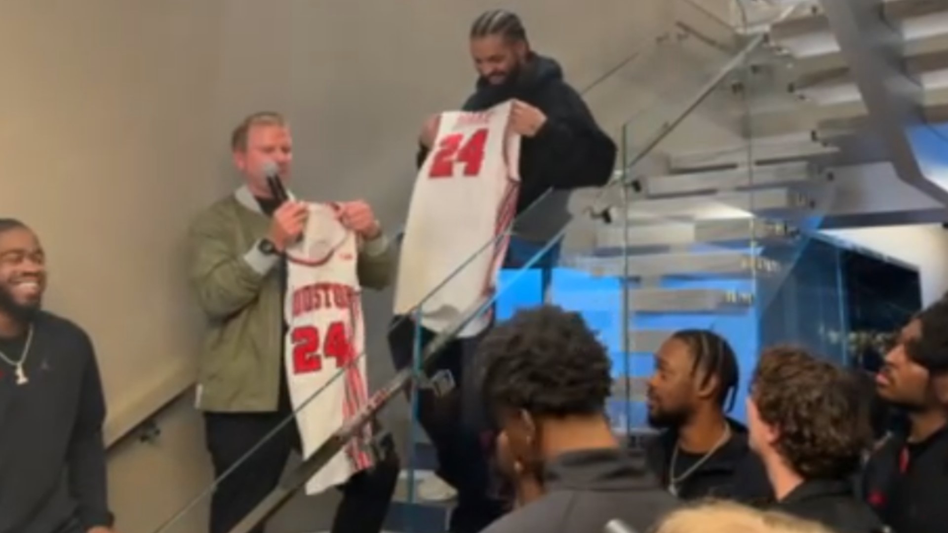 Drake was presented with a Coogs jersey with the number 24 on it, which Tilman Fertitta said "is going to be a big special year for UH."