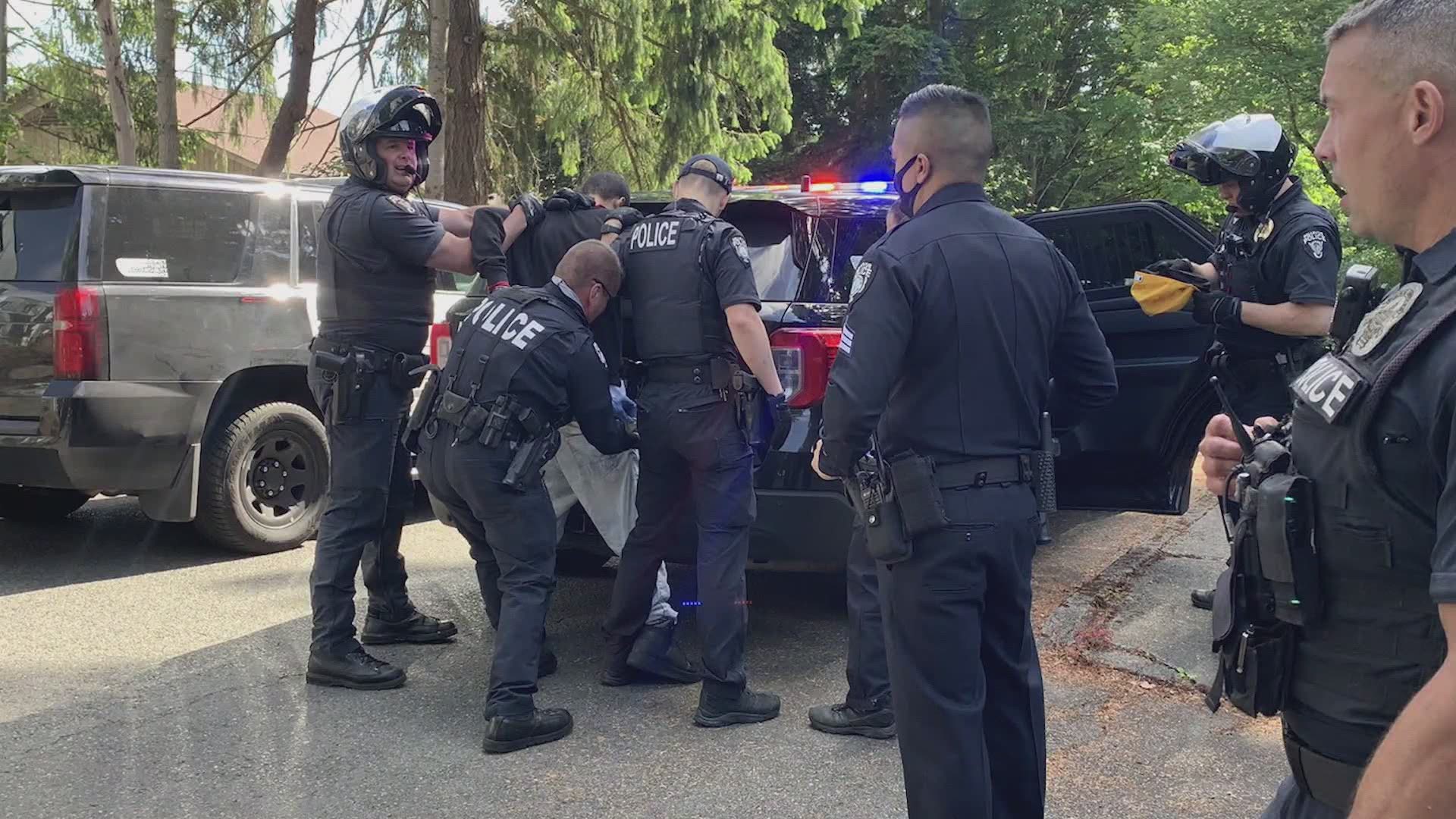A 20-year-old carjacking suspect is in custody after allegedly assaulting a valet attendant and stealing a car in Bellevue.