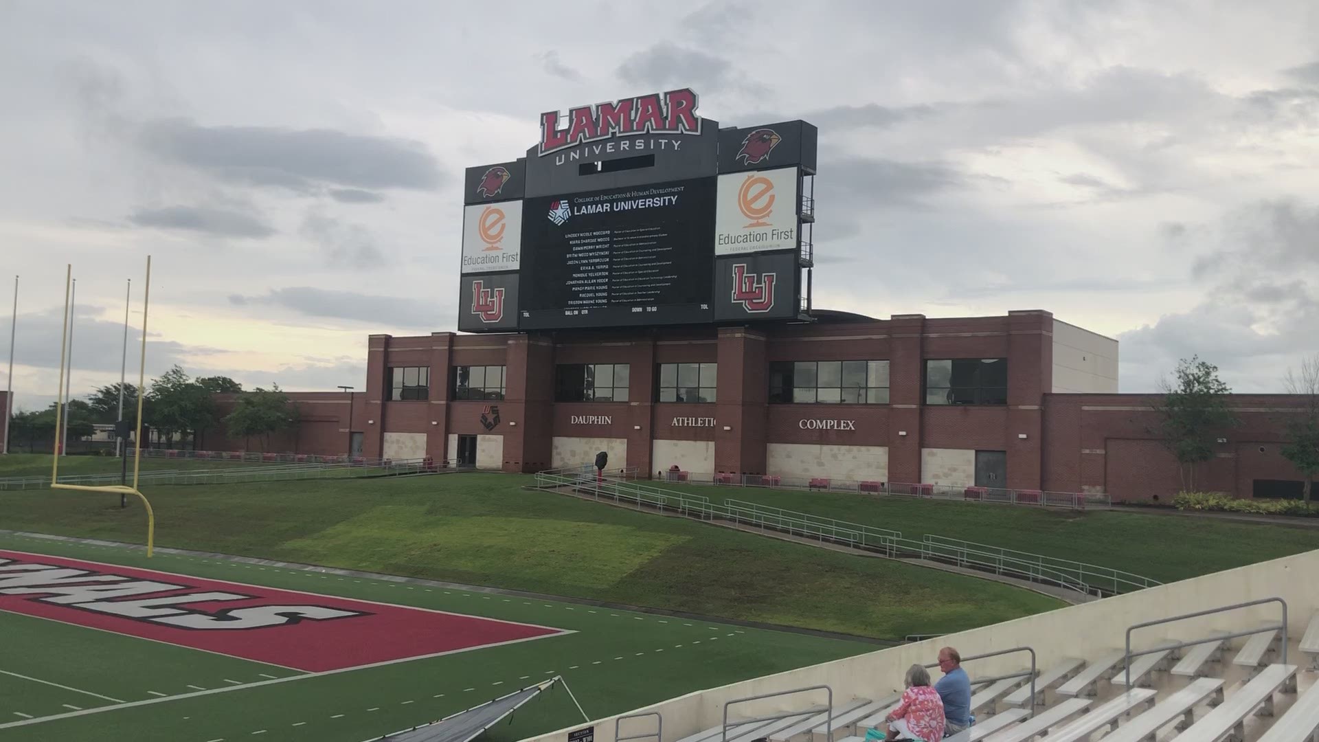 The university is displaying a slideshow for the class of 2020 on their scoreboard.