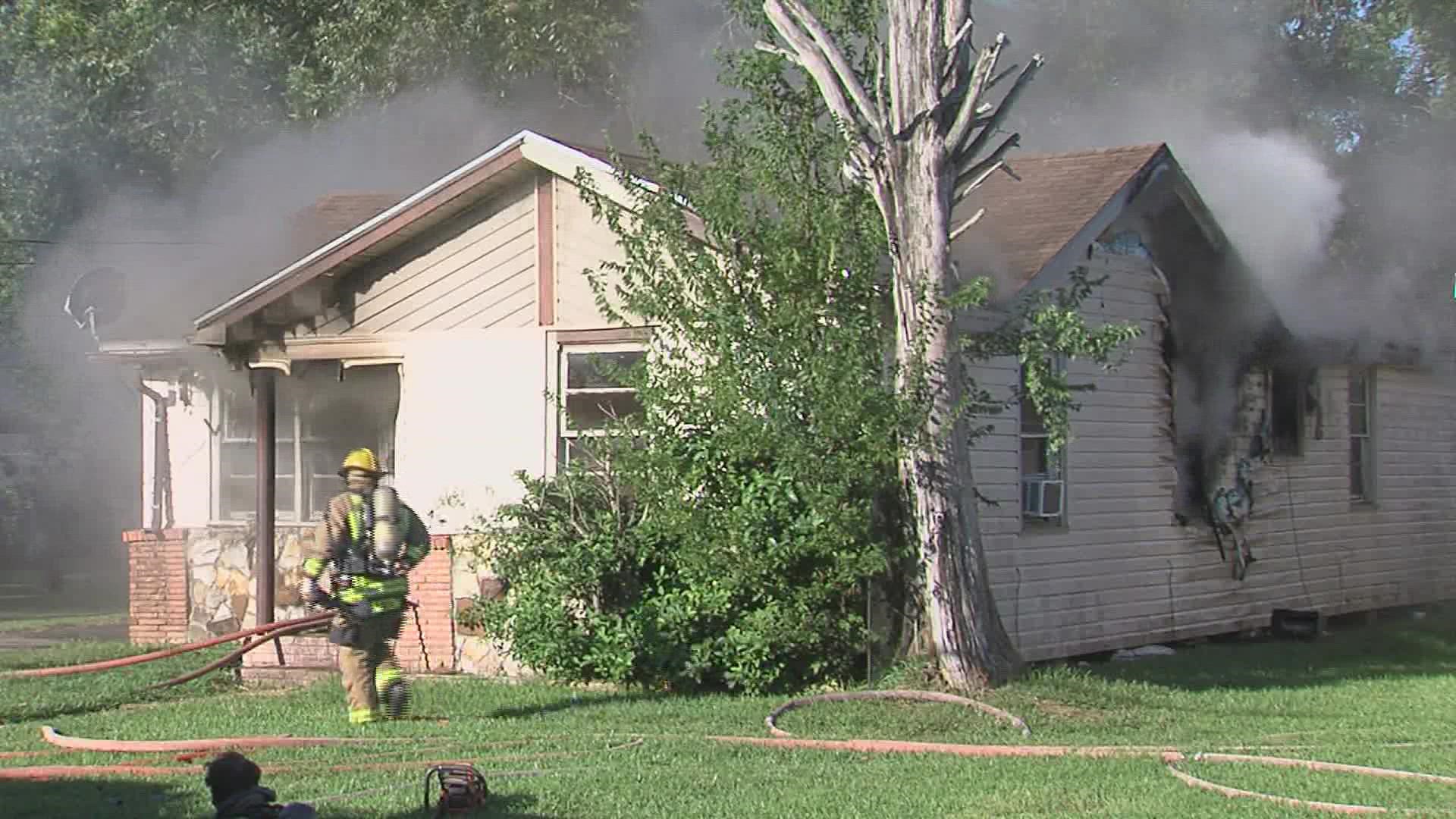 A neighbor called 911 to report the fire at about 9 a.m. Thursday morning.