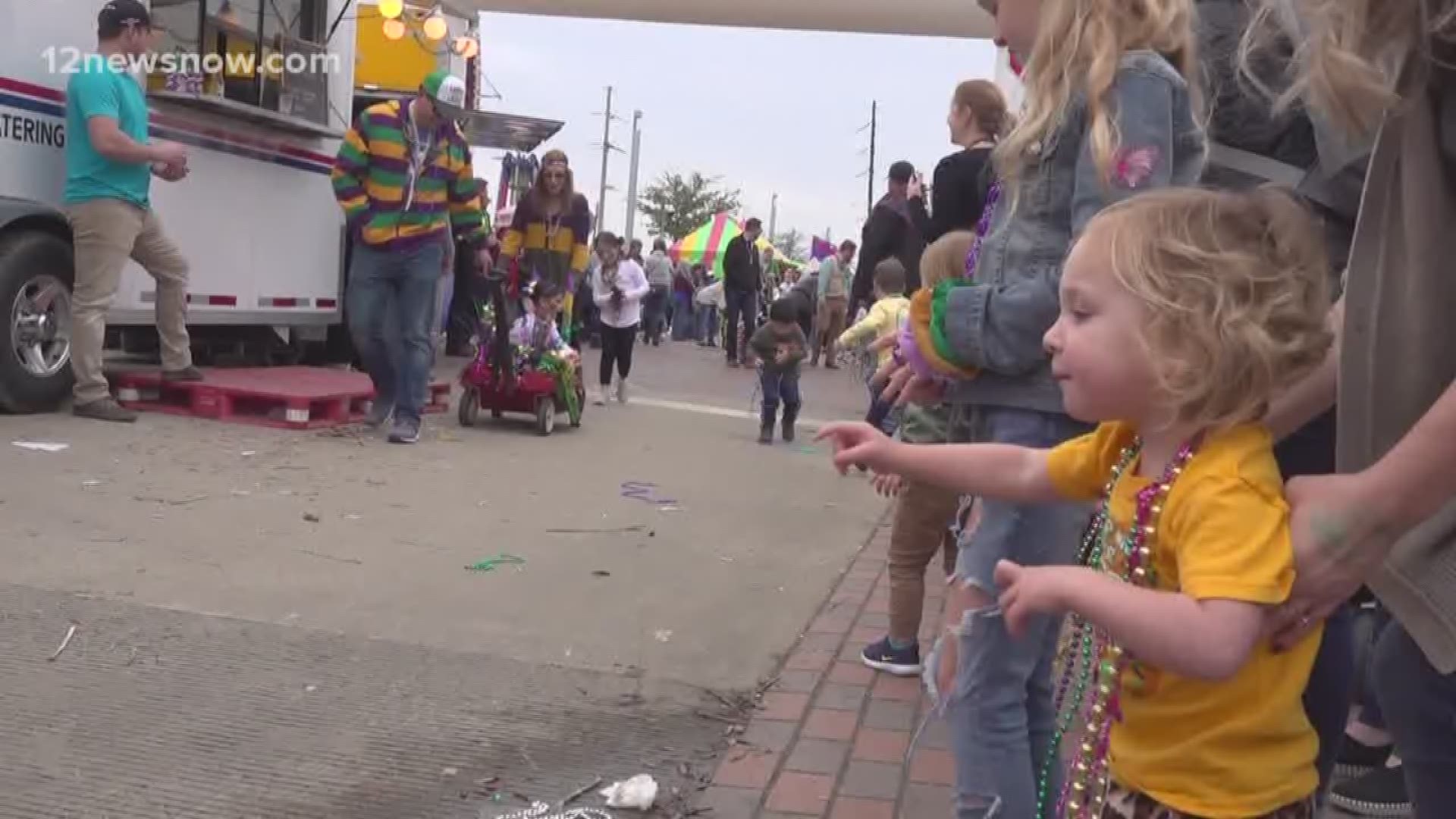 The little ones enjoyed throwing and catching beads on the last day of Mardi Gras of Southeast Texas