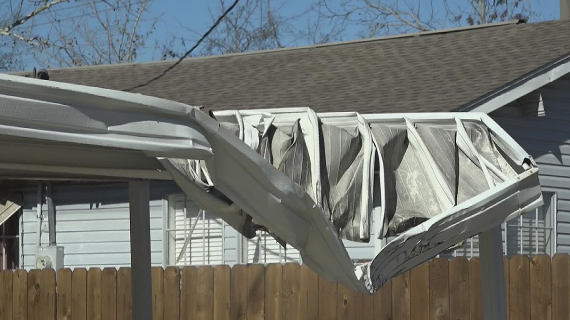 Photos of the aftermath showed toppled power lines, a hanging weather head and a crumbled car port.