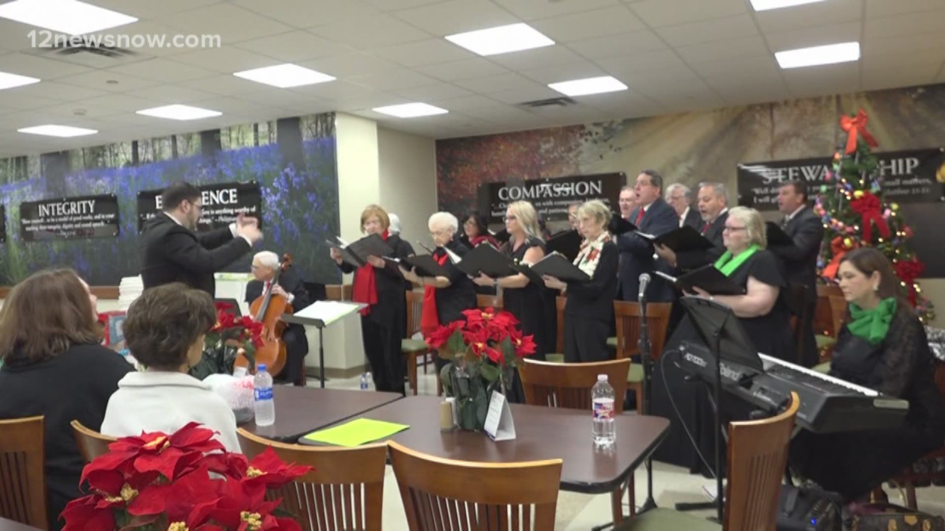 St. Jude Catholic Church choir brings Christmas cheer to Christus St. Elizabeth Hospital