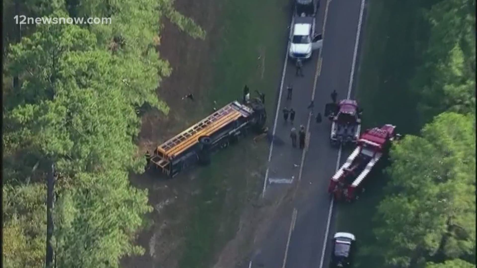 DPS is investigating how a school bus carrying a high school football team rolled over on its way to a game. This happened in Montgomery County.