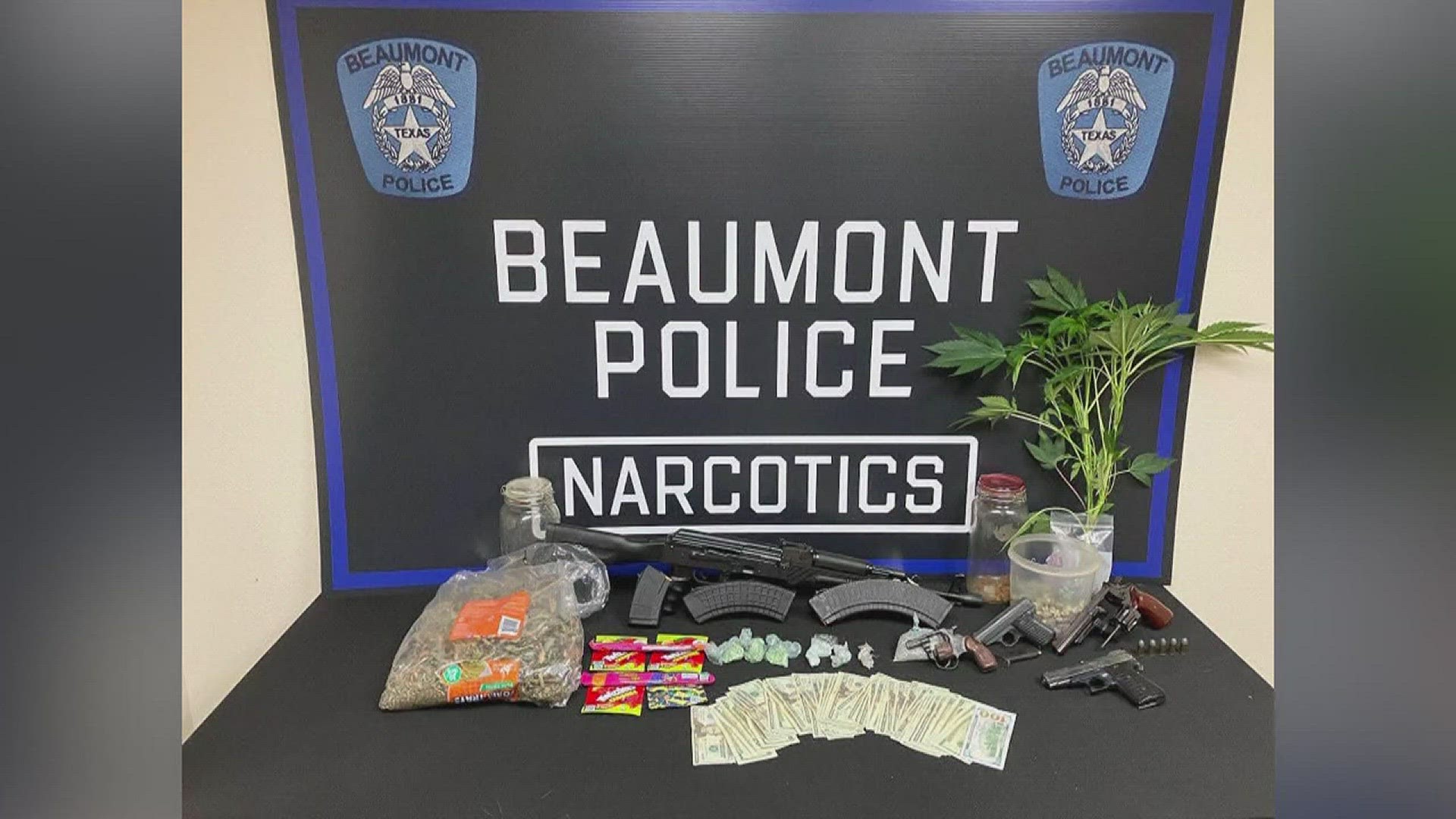 Detectives found a large amount of narcotics including suspected marijuana, methamphetamine, fentanyl, THC oil/wax, US Currency, 4 handguns and an AK style rifle.