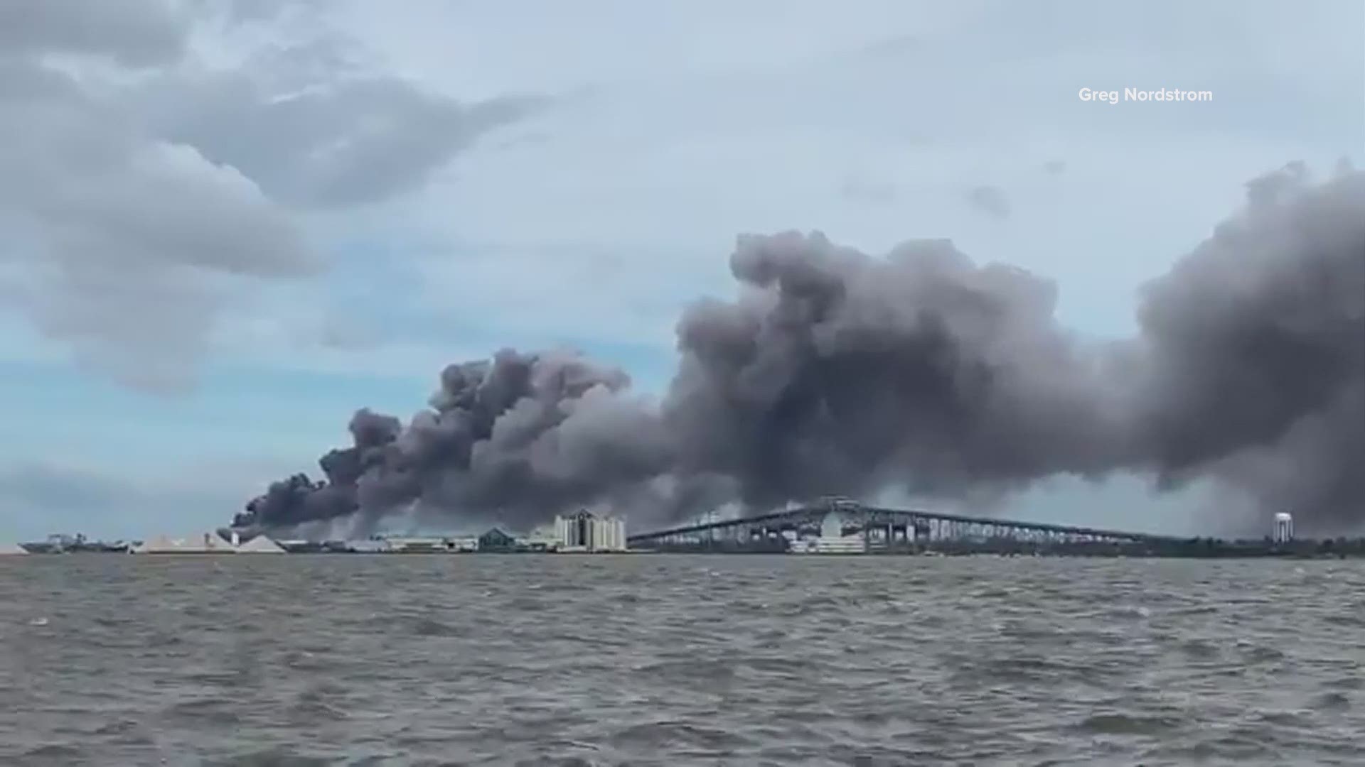 A large fire erupted at a chemical plant about five miles from Lake Charles. Videos show large plums of black smoke rising from the plant. (Credit: Greg Nordstrom)