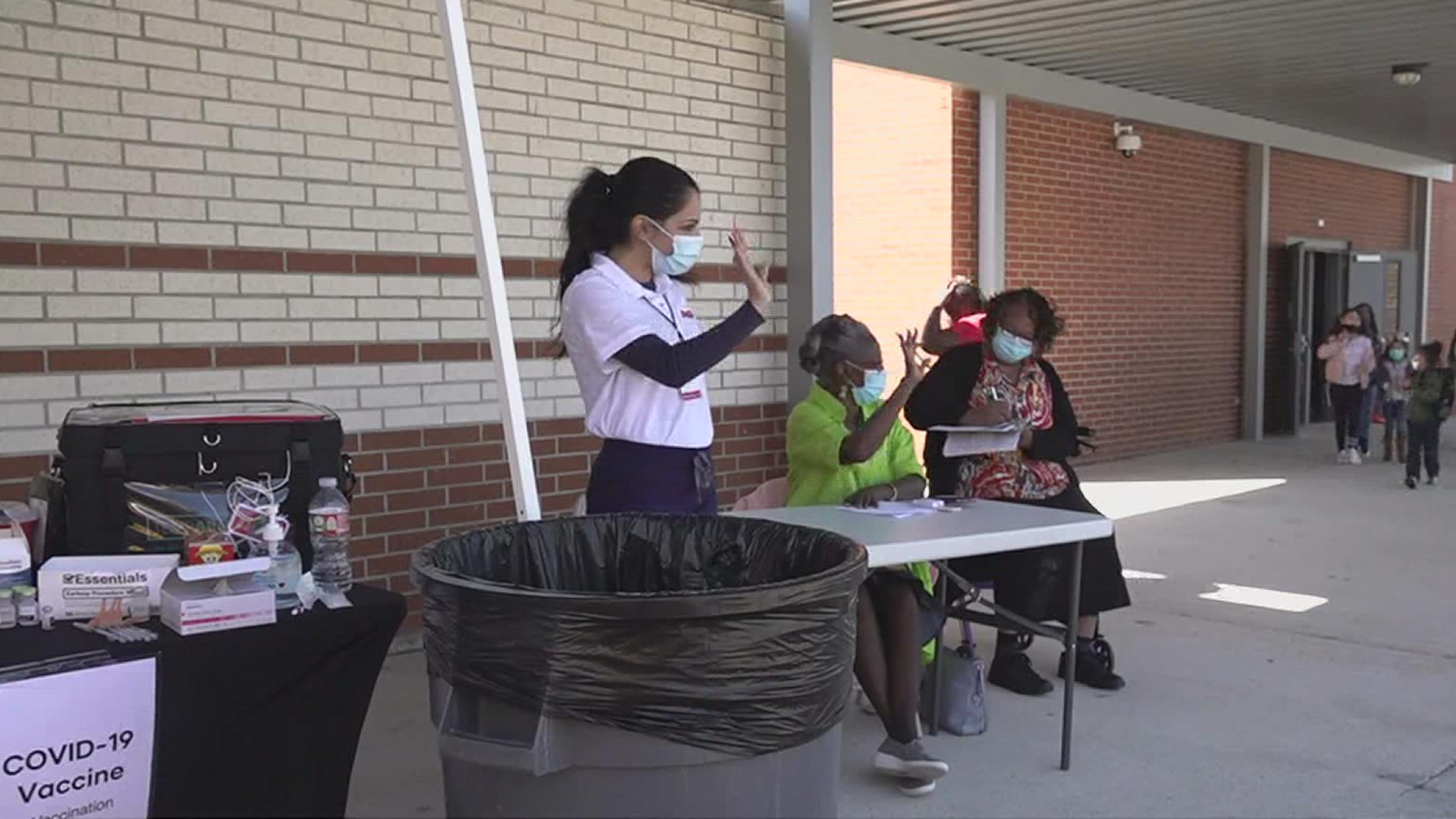 Some parents used the student vaccine drive to get their own dose of the vaccine.