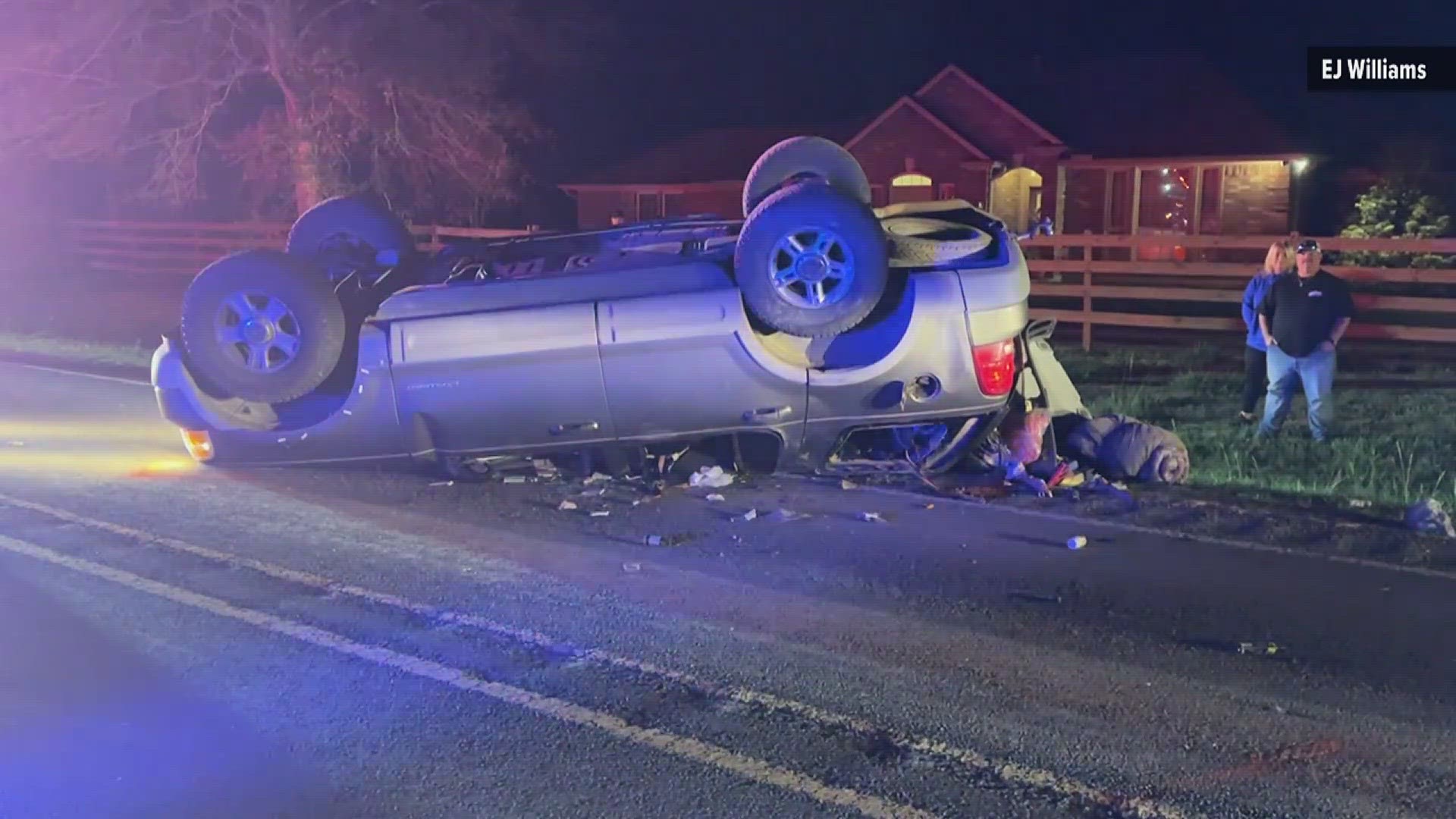 A woman is in stable condition after officials say she was trapped in the vehicle by her hair. They believe her hair prevented her from being ejected.