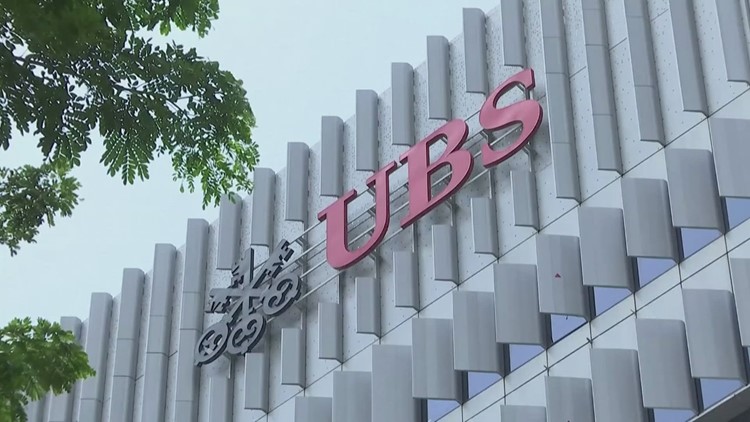 MONEY MONDAY: Swiss ban UBS buys rival, Credit Suisse