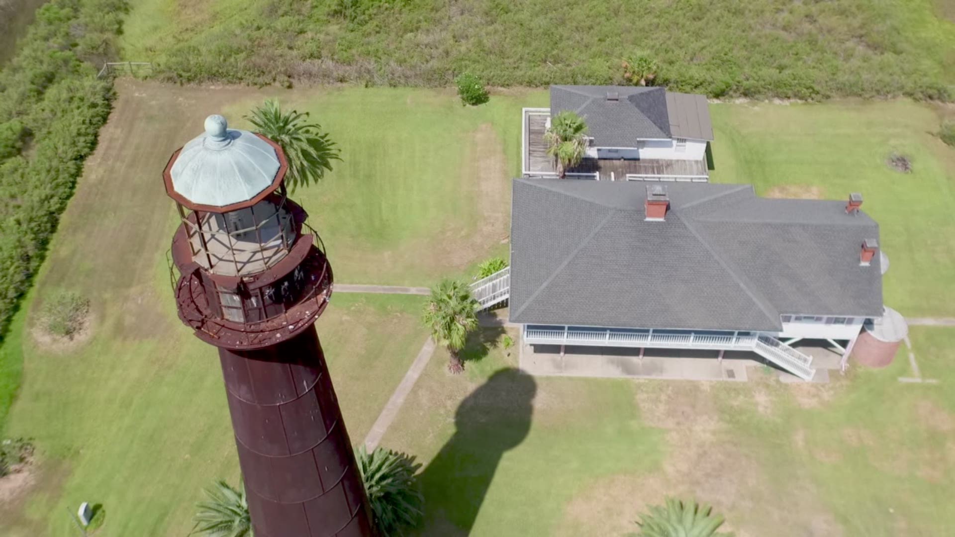 The Bolivar Lighthouse, built in 1872 by the federal government, stands at about 117 feet tall near the western tip of the Bolivar Peninsula. The lighthouse, which is registered as a historical landmark by the Texas Historical Commission, is made of brick and covered in cast-iron plates which are riveted together.
