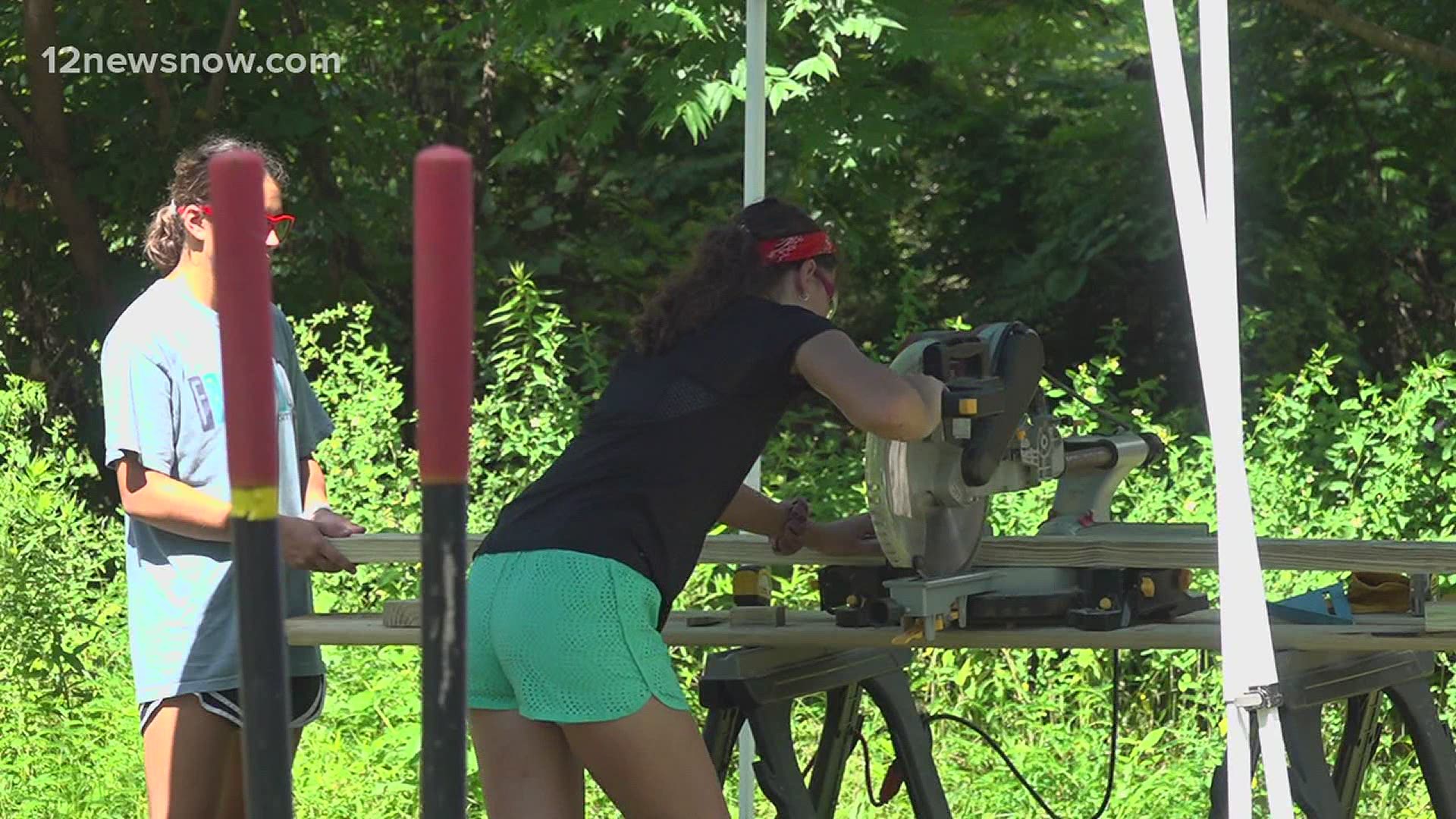 The group of teenage volunteers and their sponsors are part of an organization called U.M. ARMY, an outreach group from the United Methodist Church.