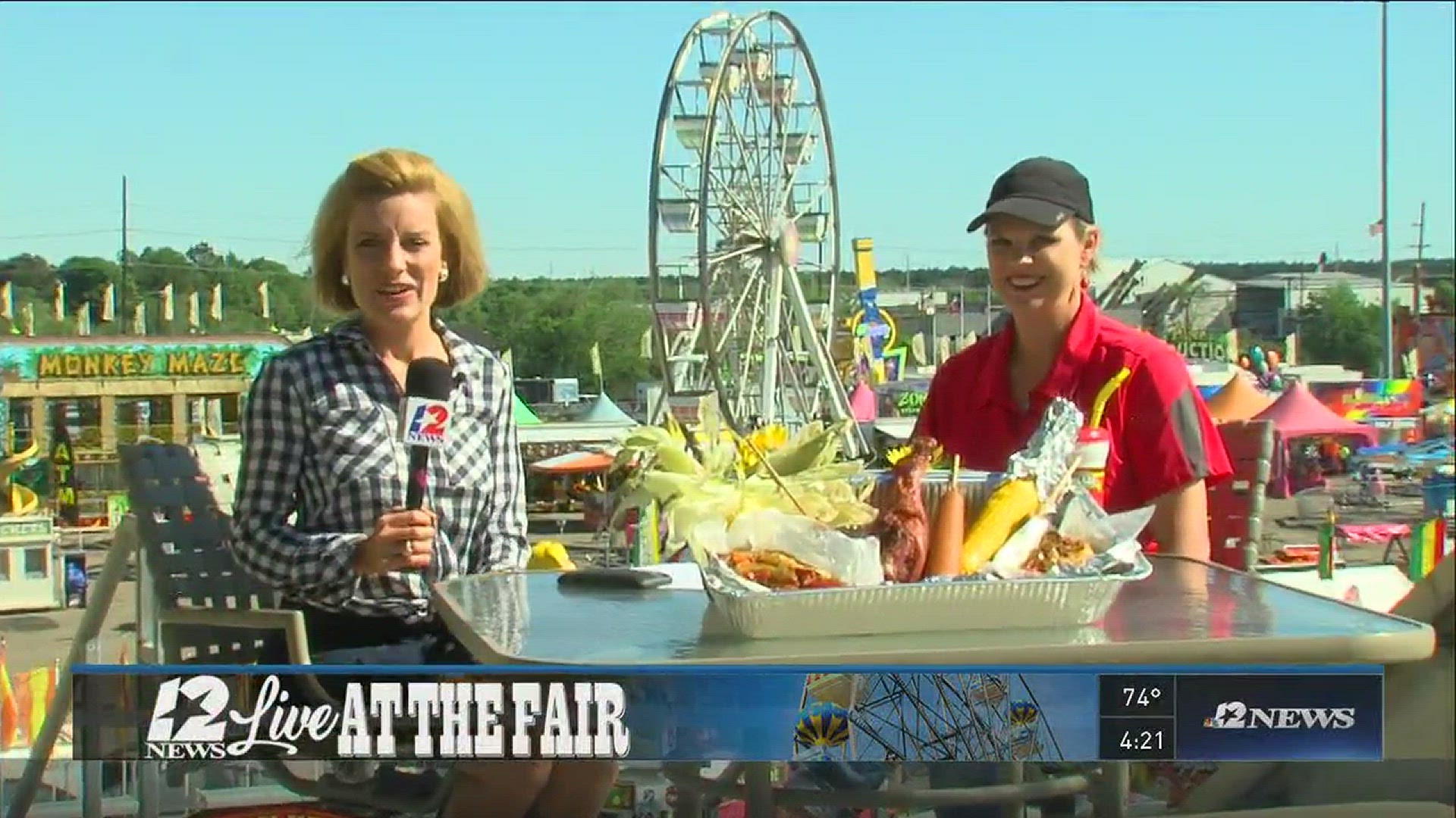 Vanessa Holmes with fair food vendor Paula Westmoreland | 12newsnow.com