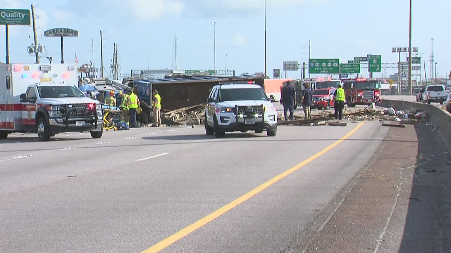 The dump truck flipped going westbound on Interstate 10 and caused all lanes to be shut down.