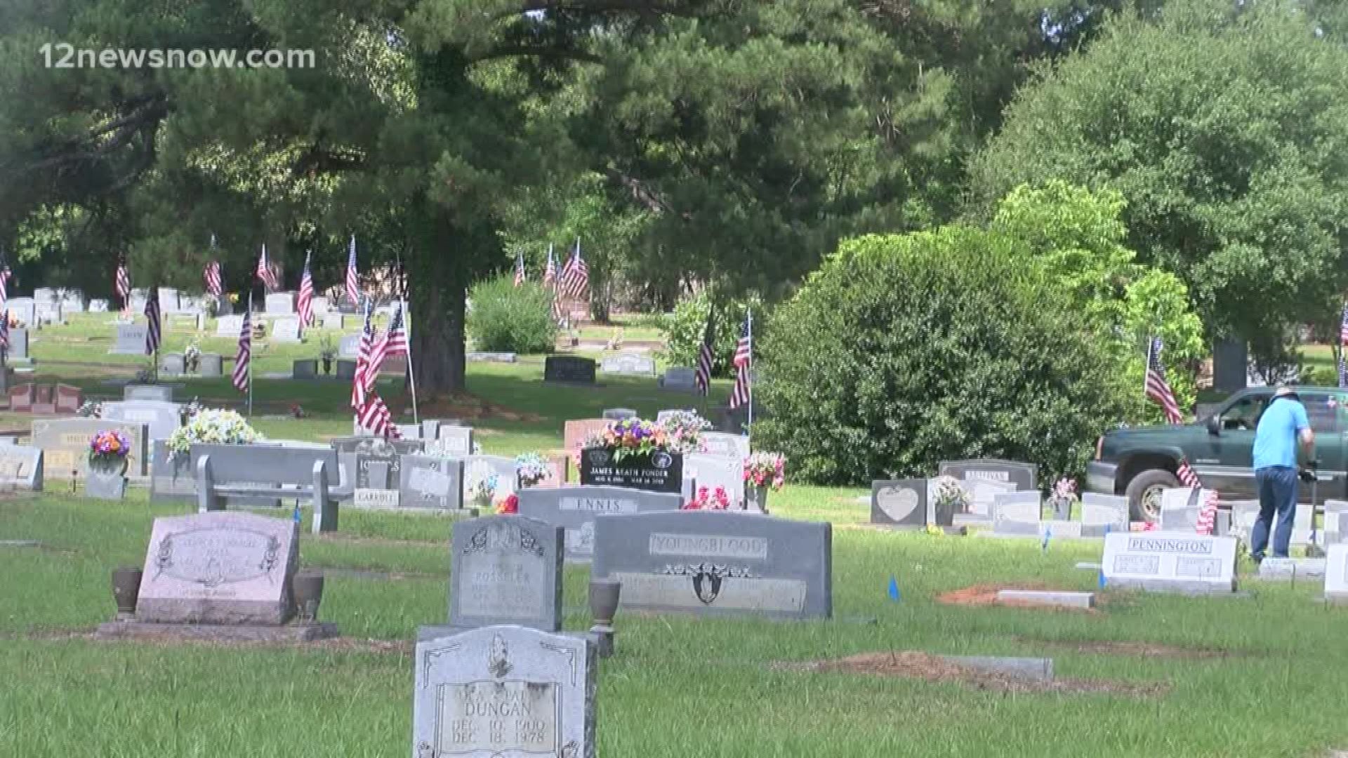 Woodville rotary club honors veterans with flags at graves