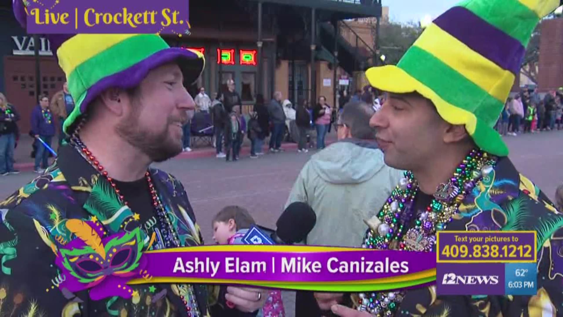 The guys are waiting to catch beads along the downtown Beaumont parade route