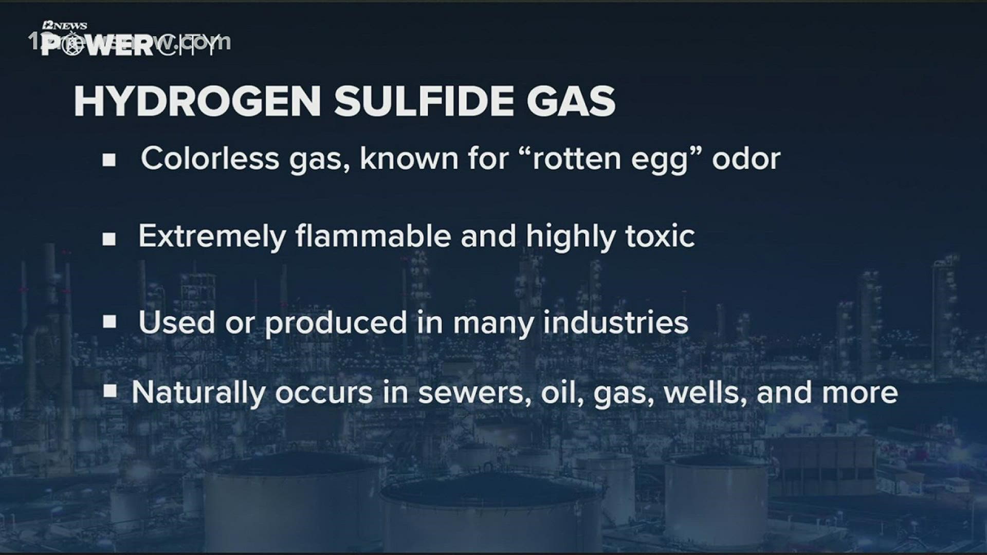 The leaking product from the trailer is releasing a small amount of hydrogen sulfide gas, which is known for its "rotten egg" smell.