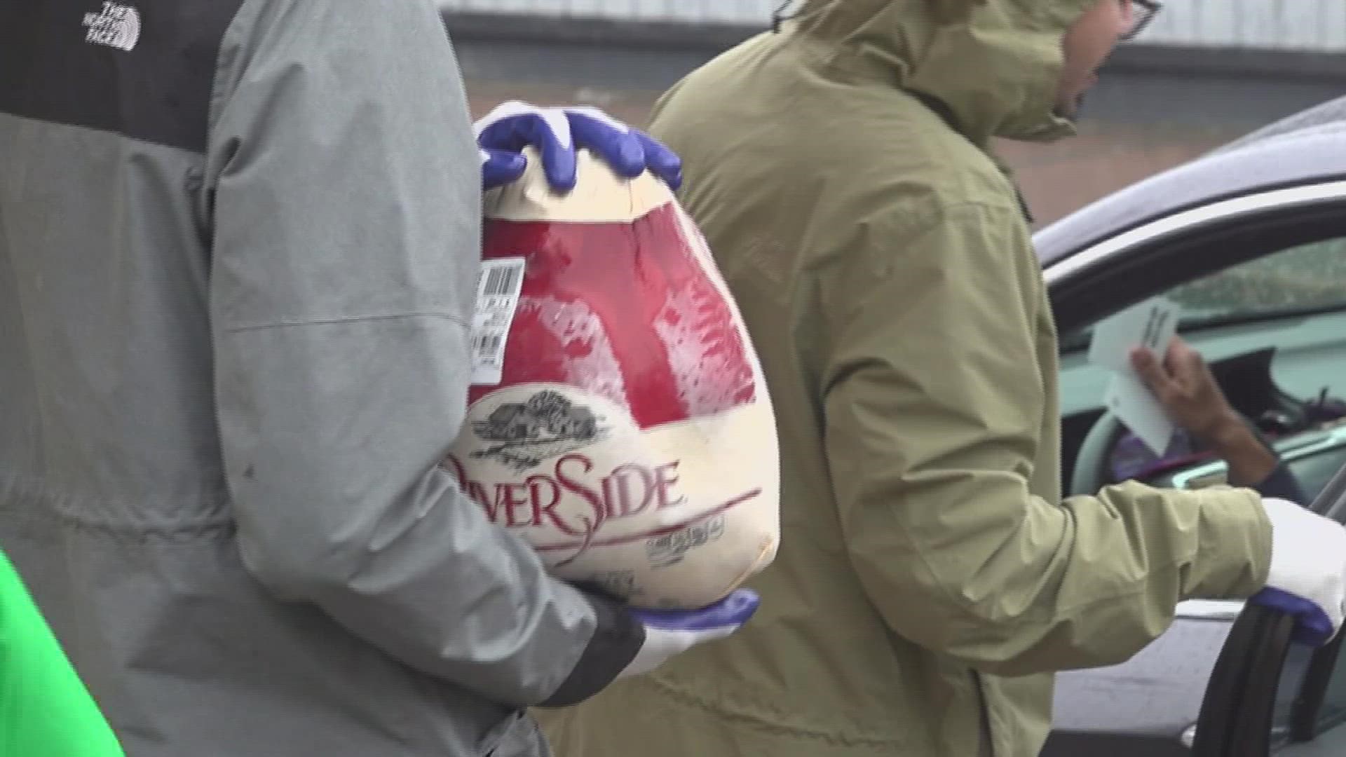Cars lined the streets in downtown Beaumont as Redemption Church held its fourth annual Turkey Day Giveaway.