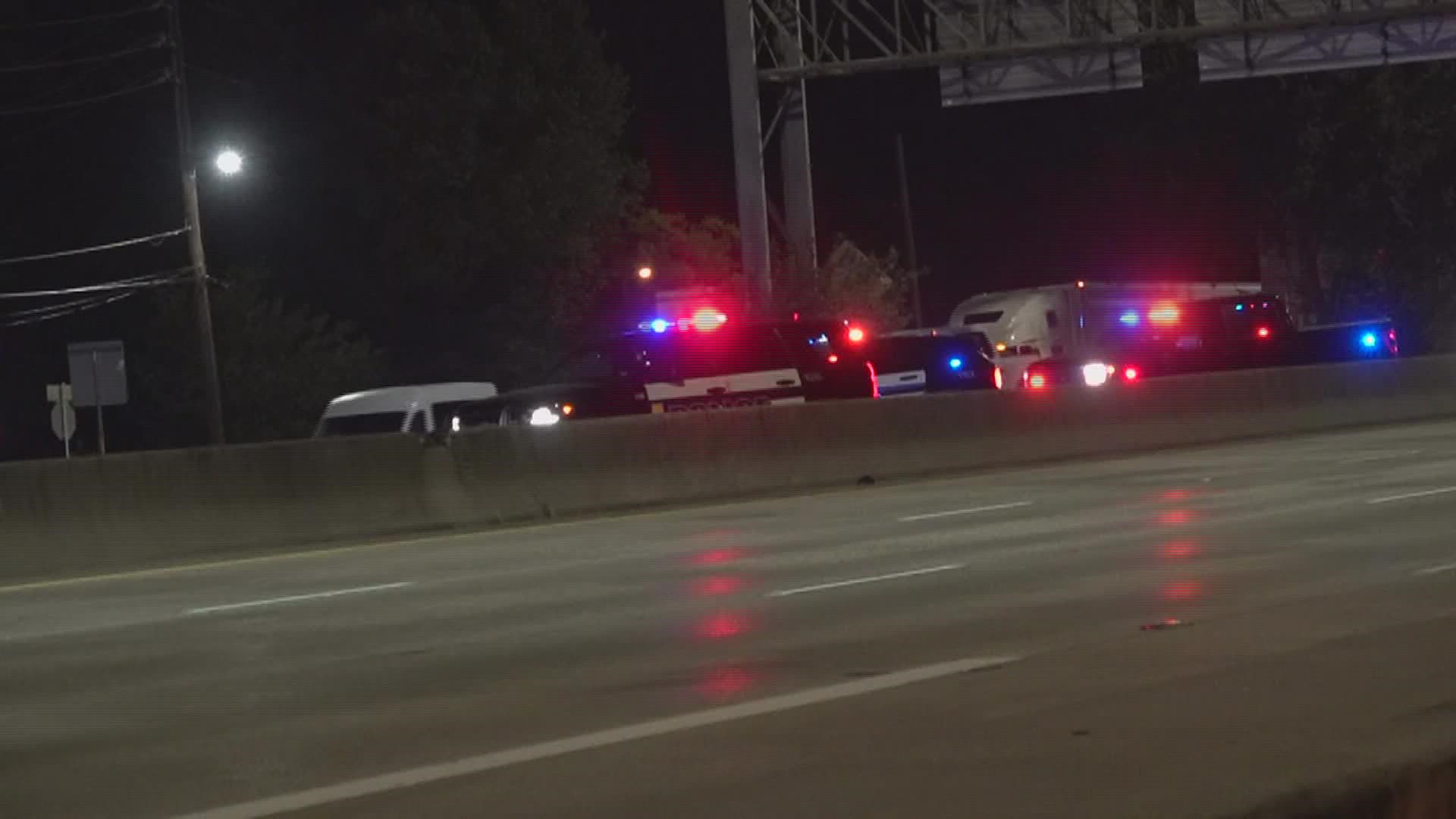 The man struck while trying to cross the interstate has been identified as Kelly June Grogan, 51, of Beaumont.