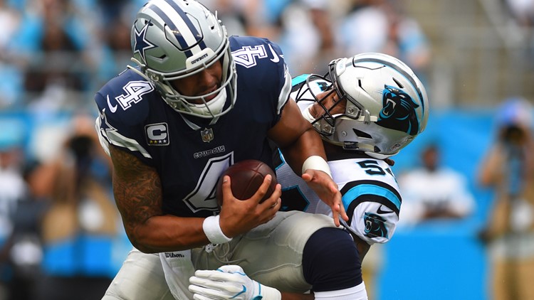 Newton, defense lead Panthers past Cowboys