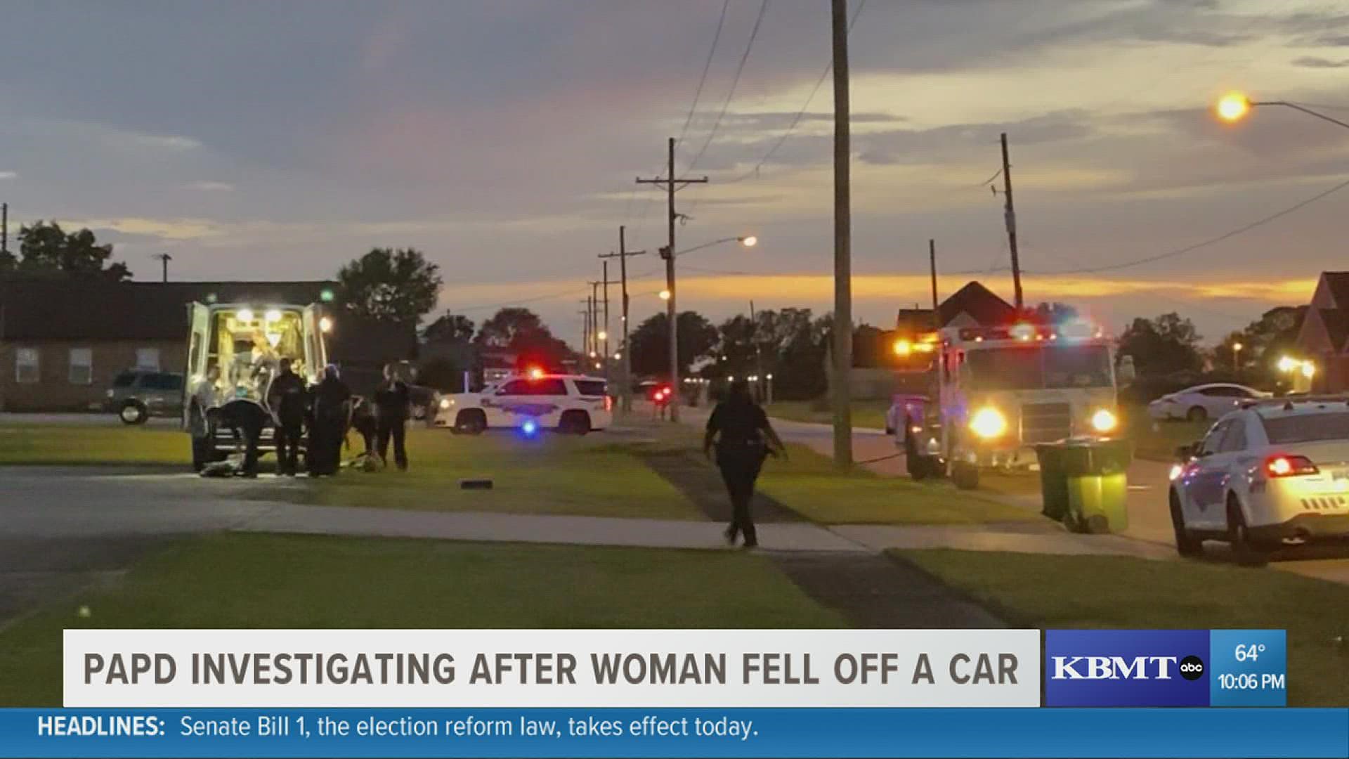 A woman is recovering in a hospital after falling from a vehicle in a Port Arthur neighborhood.