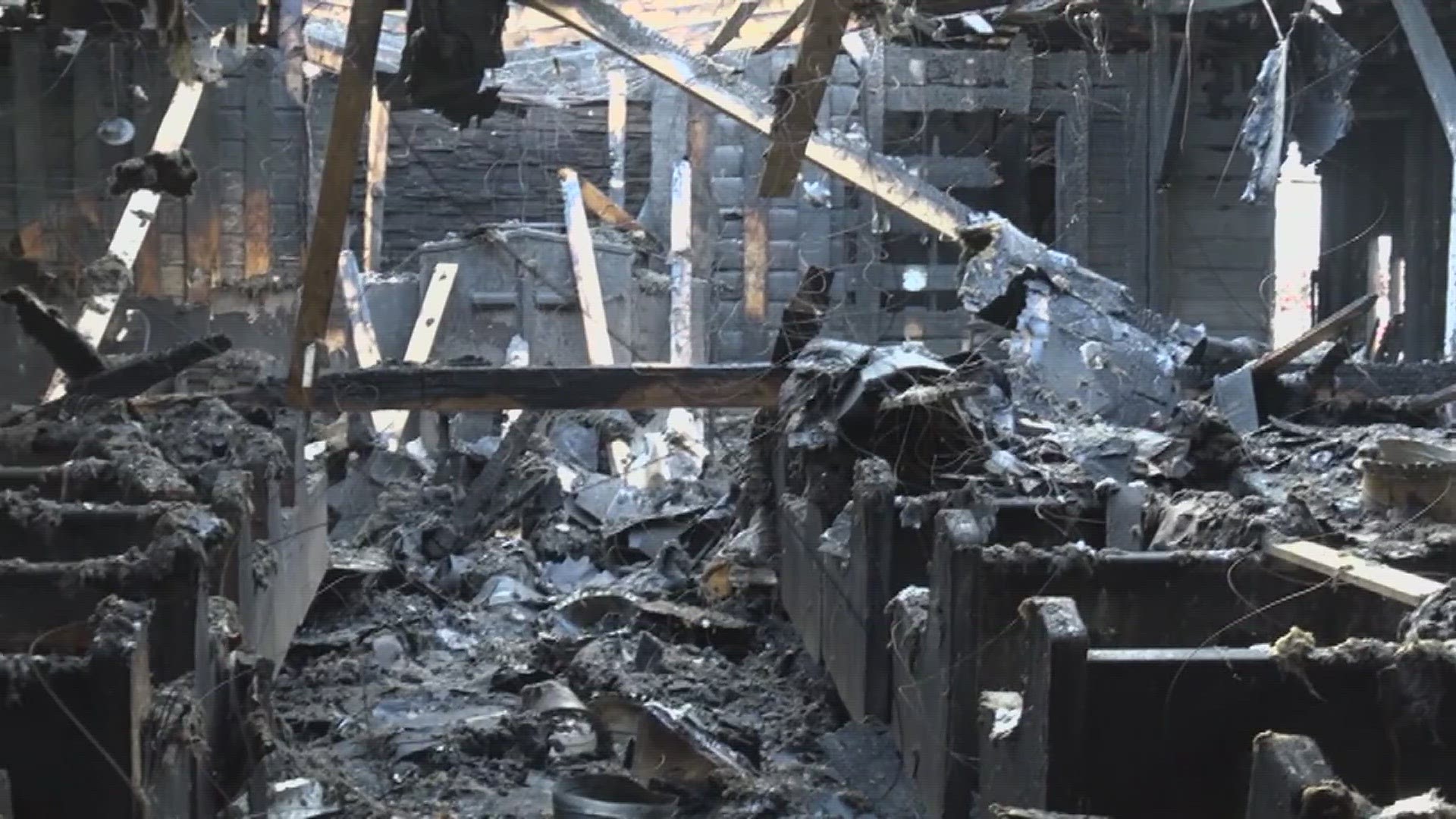 Church members have been meeting outside by the building's ruins to continue worshipping.