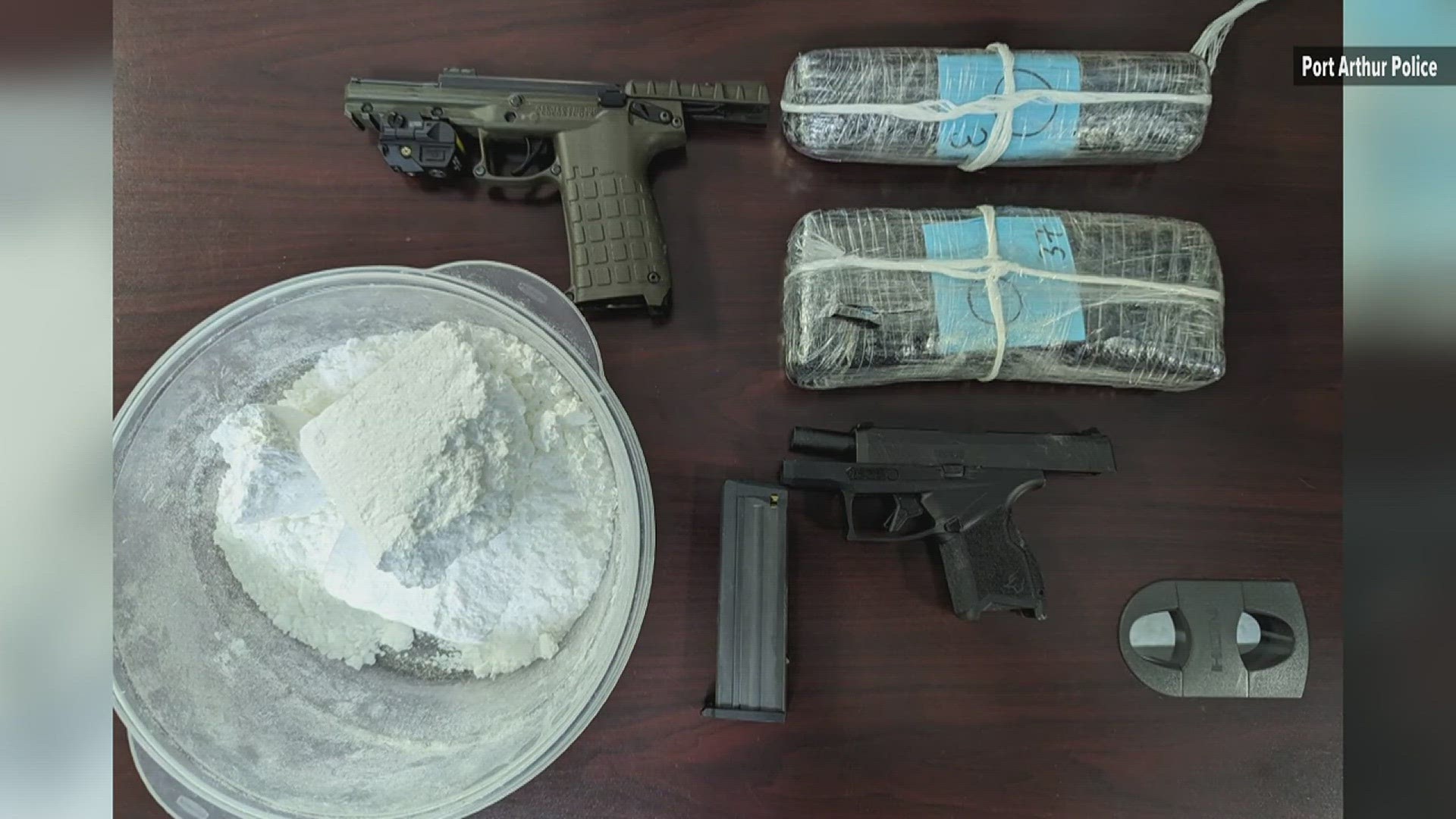 When officers searched the home they found two handguns and approximately 2,300 grams of cocaine.