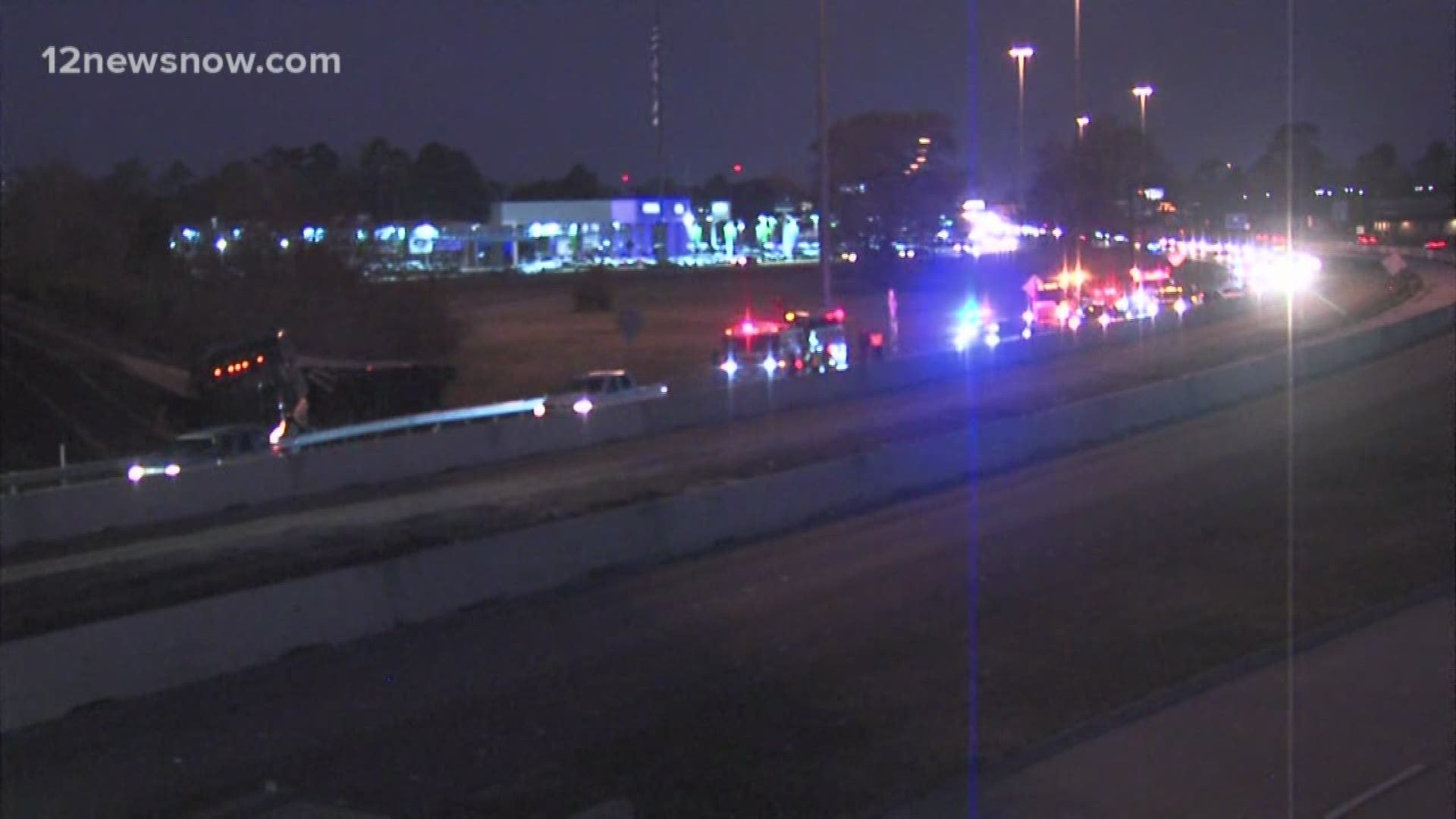 An overturned 18-wheeler along southbound U.S. Highway 69 under the 11th Street exit flyover is backing up traffic in the area.